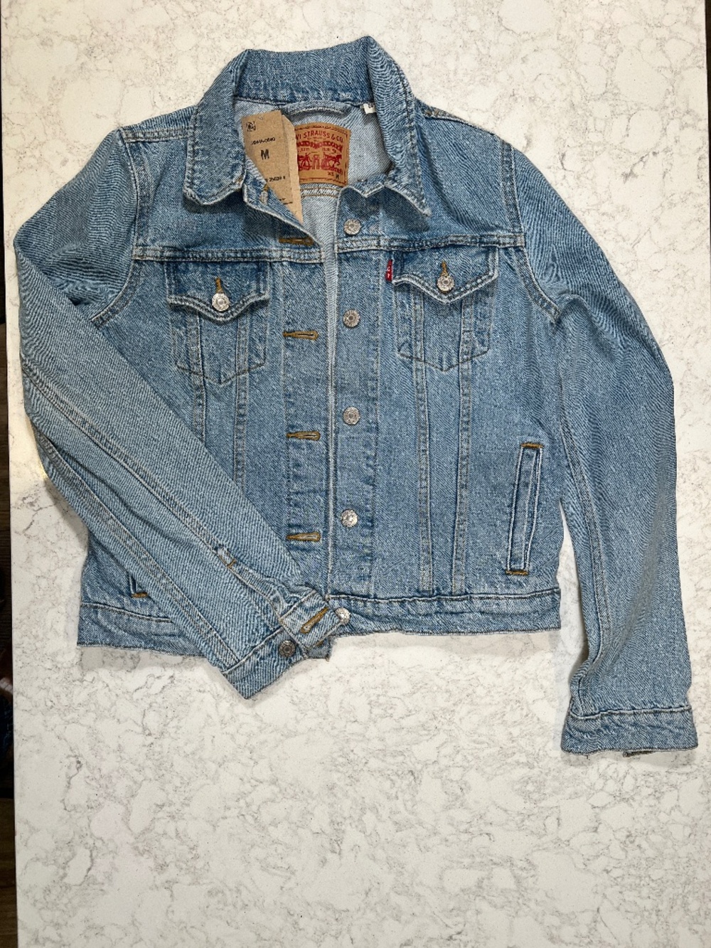 New, with tags, Women's Levi's Original Trucker Jacket sized Medium in Denim